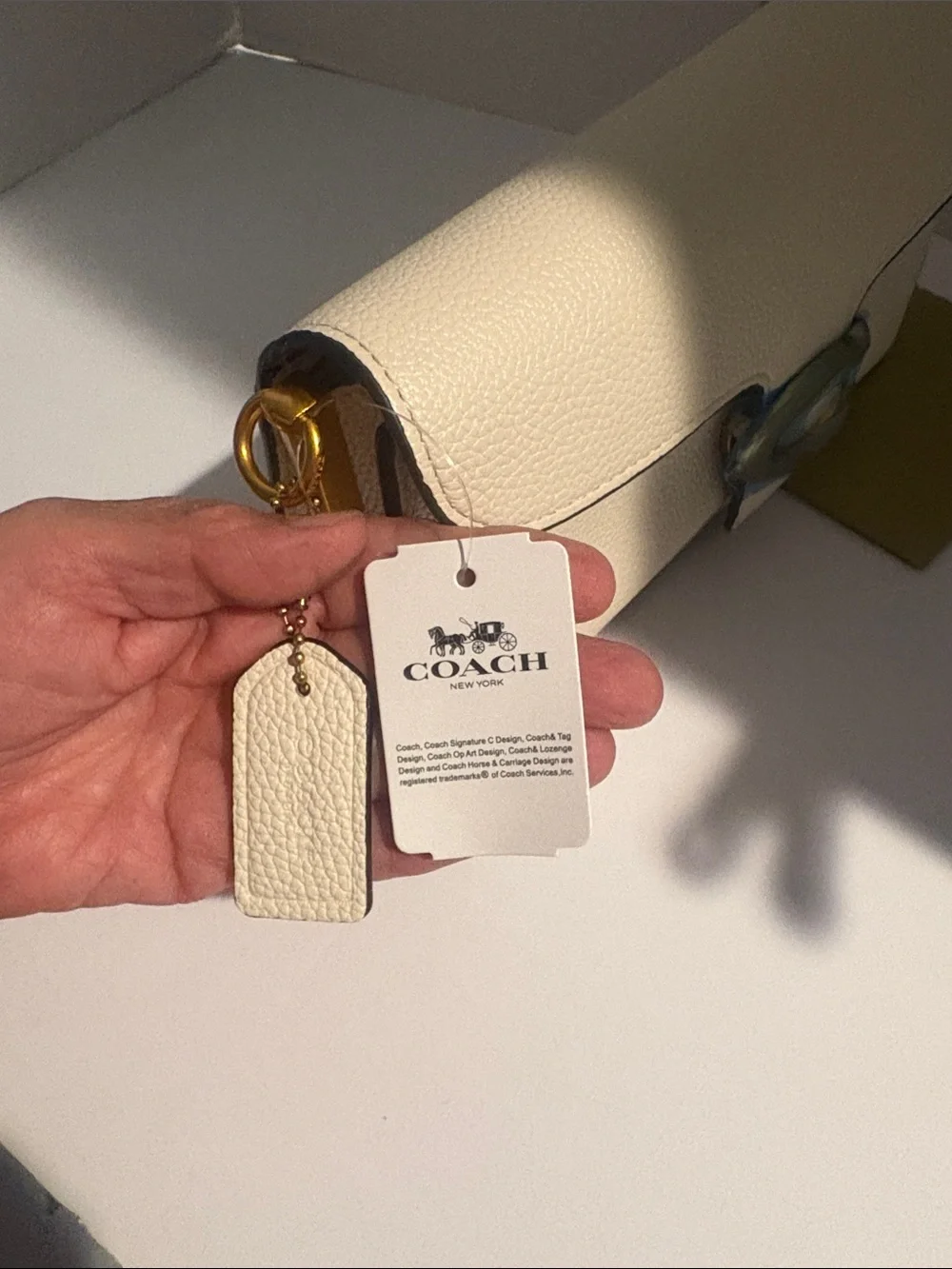 Coach Cream Pebbled Leather Clutch with Gold 'C' Accent